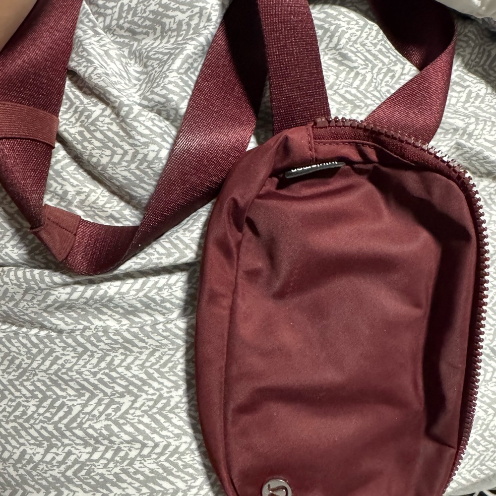 Lululemon Athletica Red Crossbody Bag with Sleek Design